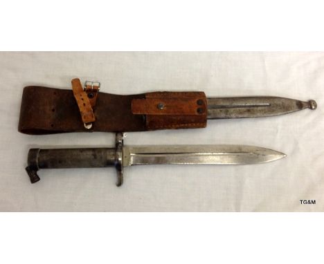 A Swiss double edged Bayonet in its scabbard. Manufactured by Waffenfabrik Neuhausen of Wenger