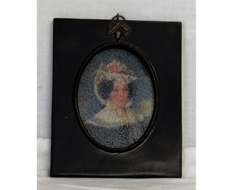 A framed miniature portrait