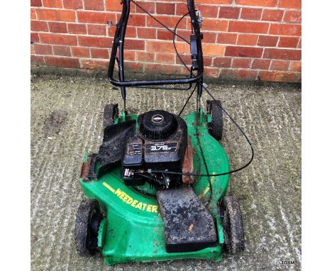 A 'weedeater' lawnmower with Briggs & Stratton sprint 3.75HP engine 