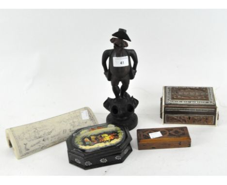 An assortment of collectables, to include a Russian lacquered lidded box, carved wooden stamp box, trinket box and more