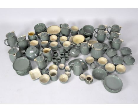 A extensive contemporary Denby Manor Green ceramic tea and dinner service, including teacups, saucers, bowls, teapot and much