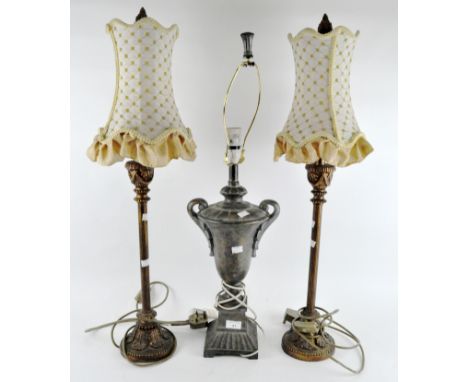 A pair of contemporary decorative table lamps, of columned form, approximately 77cm high (with shades), together with an urn 