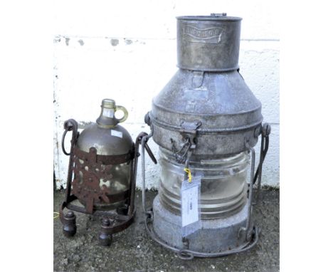 A lantern and a ship's alcohol bottle with stand, maximum height 51cm