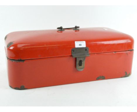 A Scandinavian red enamel box, with curved edges and a hinged lid, metal handle to the top and latch, width 47cm
