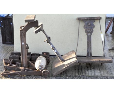 A set of vintage industrial cast iron and wood weighing scales, marked 'Bartlett Bristol.. to weigh 3 GWT', on wheels, with v
