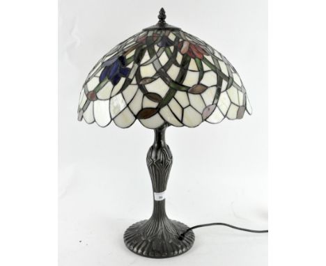 A vintage Tiffany style table lamp, with leaded glass floral shade, approximately 55cm high