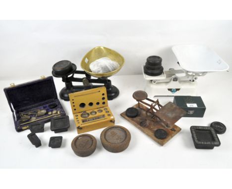 Vintage sets of scales, one white enamelled example labelled 'The Rex', one black enamelled example, together with a number o