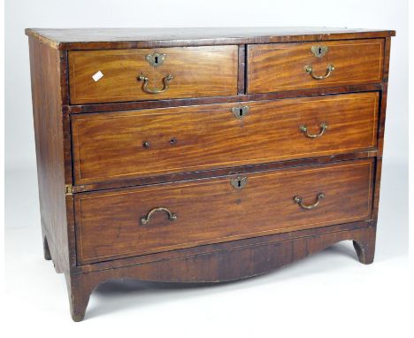 A 19th Century mahogany chest of drawers, two short drawers above two longer drawers, with banded edging and brass drop handl