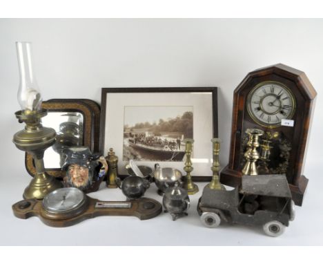 A collection of 20th Century collectables, including a wooden mantle clock, barometer, brass candlesticks, an oil lamp, pair 