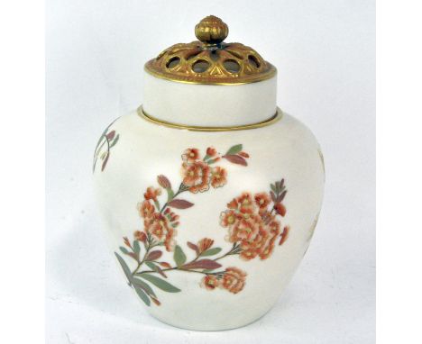 A Royal Worcester blush ivory lidded pot-pourri decorated with sprigs of flowers and gilt details, numbered 1112 to base and 