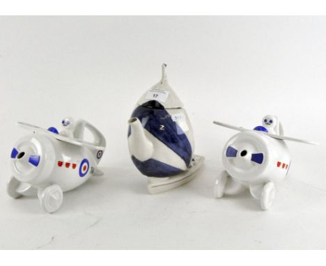 A group of three ceramic novelty tea pots, comprising two Westfield pottery planes, 21cm wide and a similar ceramic yacht