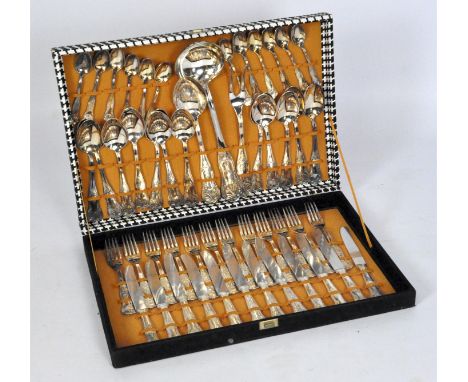 An extensive canteen of silver plated cutlery, including forks, spoons, serving ladle and more