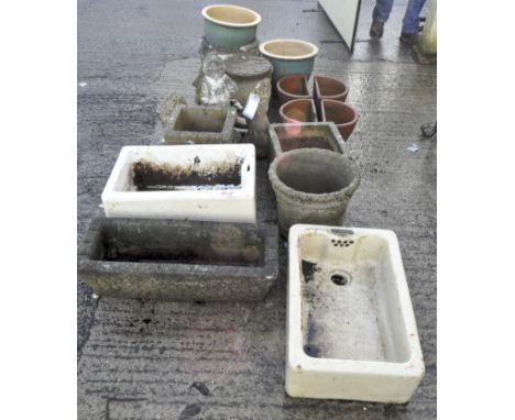 A collection of garden pots of stone and terracotta, together with ceramic wash basins and some garden figurines, maximum hei