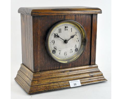 A mid 20th Century American Sessions Clock Company mantle clock, oak cased, the dial with Arabic numerals denoting hours, 25.