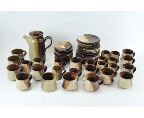 A vintage Wells glazed pottery tea set, including tea cups, saucers, teapot and more