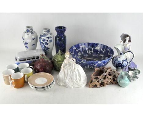 A pair of Chinese porcelain blue and white baluster vases, 24 cm high, a collection of five Susie Cooper harlequin coffee cup
