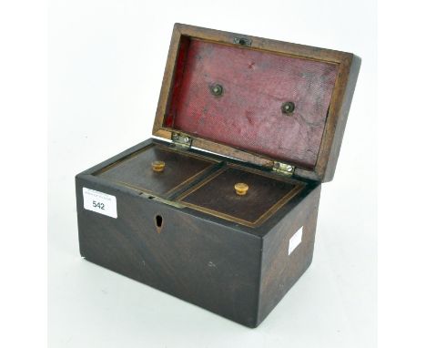 A late Victorian mahogany tea caddy, with two inner compartments and a metal handle to the top, lined in red vellum, height 1