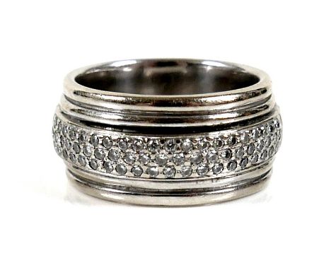 An 18ct white gold band ring, with diamond chip panel to the front, size N, 16.0g. 