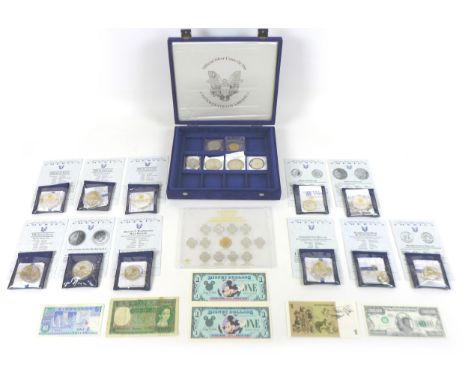 A collection of American and Canadian coins, including seven silver $1 coins, comprising 1988, 1991, 1992, 1993 and 1994 Silv