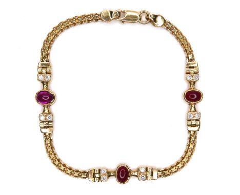 An Egyptian 18ct yellow gold, ruby and garnet bracelet, with the cabochon ruby and two garnets, each 6 by 4 by 3mm, in rub-ov