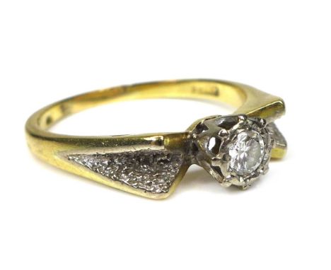 An 18ct gold illusion set diamond solitaire ring, round cut stone size 3mm diameter, size T, 5.2g. 