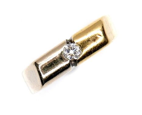 An 18ct bi-coloured gold and diamond ring, the central brilliant cut diamond of approximately 0.08ct, size P, 7.4g. 