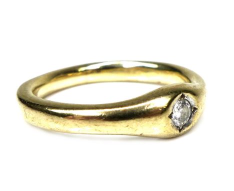 A 9ct gold diamond solitaire gypsy ring, stone approximately 3mm diameter, size T, 5.8g. 