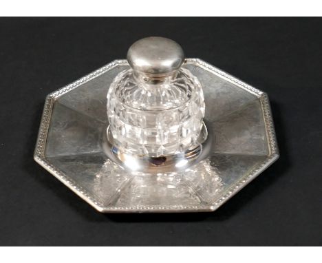 A Victorian silver inkwell, with octagonal dish stand, cut glass bottle and hinged cover, Henry Wilkinson &amp; Co, Sheffield