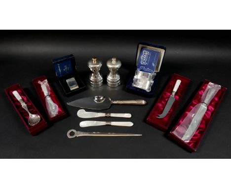 A collection of ERII silver, including a pair of napkin rings with case and still in plastic wrapping, Carr's of Sheffield Lt