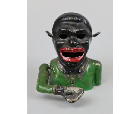 Vintage novelty money box.This item is listed on the basis that it is illustrative of a bygone culture in which there were di
