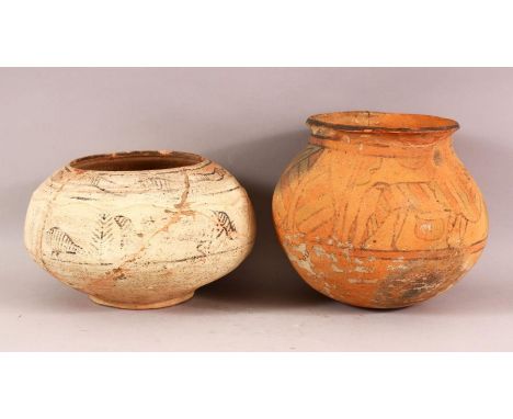 TWO INDUS VALLEY CERAMIC VASES, both painted with animals and stylised motifs, 18.5cm high and 15cm high.