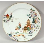 A GOOD 19TH CENTURY CHINESE PORCELAIN PLATE, with enamelled decoration depicting a temple and