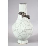 A GOOD CHINESE CRACKLE GLAZED VASE, with moulded dragon to the neck, 23cm high.