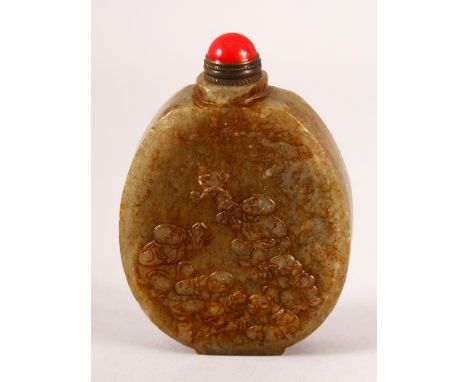 A CHINESE CARVED JADE SNUFF BOTTLE - carved with boys and funghi the verso with calligraphy, 8cm