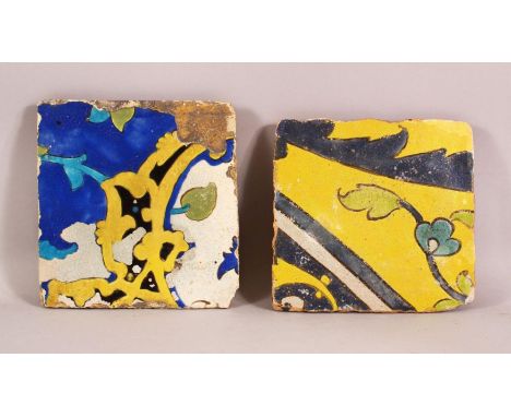 TWO ISLAMIC / PERSIAN POTTERY TILE SECTIONS - 21cm &amp; 20cm.