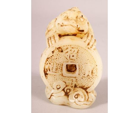 A CHINESE CARVED JADE TOAD &amp; CURRENCY FIGURE, the toad stood holding a coin, 10cm high