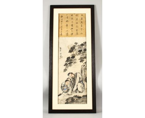 A CHINESE SCHOOL SCROLL PAINTING depicting seated figures of a man and a young boy beneath a calligraphy panel, 86cm x 26cm.