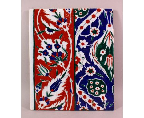 A TURKISH IZNIK STYLE POTTERY TILE SECTION, with floral decoration, 33cm x 27cm