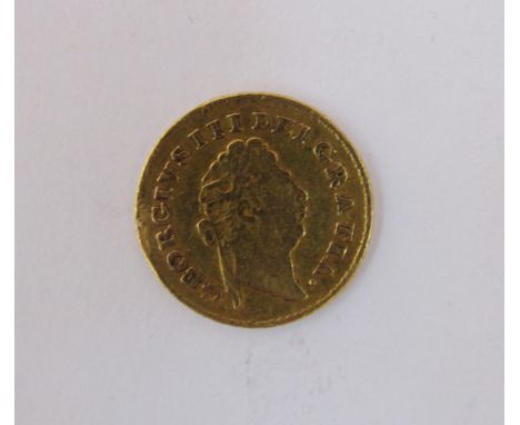George III guinea 1798, 1st laurel head, red, date below crown, light buckling at 9 o'clock on obverse, 2.7grms.