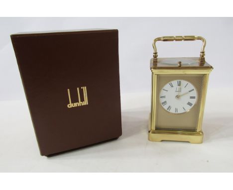 Dunhill brass repeater carriage clock&nbsp;having engine-turned face surrounding a white enamel dial, plain case, striking mo