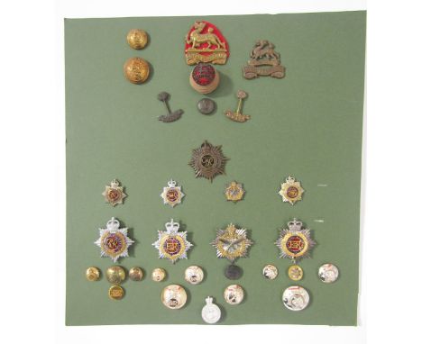 Collection of British Army cap badges, cloth badges, rank markings and shooting medals.