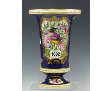 A FRENCH PORCELAIN VASE PAINTED IN IMITATION OF 18TH CENTURY WORCESTER WITH EXOTIC BIRD RESERVES ON A BLUE SCALE GROUND, GOLD