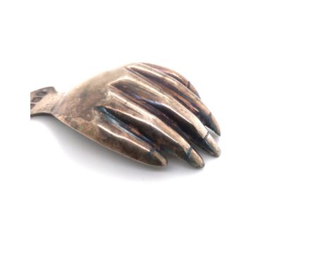 A GEORGIAN HALLMARKED SILVER HAND FORM CADDY SPOON. LENGTH 6.7cms. WEIGHT 8.52grms. 