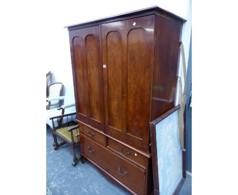 A 19th C. MAHOGANY LINEN PRESS, THE TOP WITH DOORS EACH WITH TWO ROUNDED TOPPED PANELS AND ENCLOSING SLIDES ABOVE TWO SHORT A
