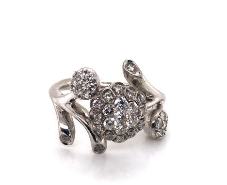 AN 18ct WHITE GOLD HALLMARKED FOLIATE CLUSTER RING WITH STYLISED BRANCH DESIGN. APPROX DIAMOND WEIGHT 0.78cts. FINGER SIZE K.
