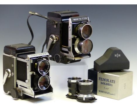 A MAMIYA C330 PROFESSIONAL F CAMERA, A SIMILAR MODEL C3, THREE LENS SETS AND OTHER ACCESSORIES