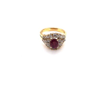 AN EGYPTIAN RUBY AND DIAMOND CLUSTER STYLE RING. UNHALLMARKED, STAMPED WITH EGYPTIAN GOLD MARKS, ASSESSED AS 18ct GOLD. FINGE