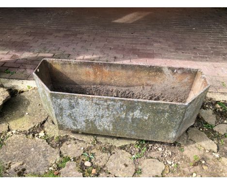 A CAST IRON CANTED TROUGH W 120 D 41 H 38. VIEWING FOR THIS ITEM IS BY APPOINTMENT ONLY, AND IS NOT AT JS FINE ART BUT LOCATE