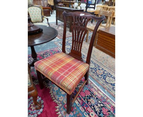 A GEORGE III MAHOGANY ELBOW CHAIR WITH PIERCED FOUR HORIZONTAL BAR BACK, THE UPHOLSTERED SEAT ON CHANNELLED LEGS TOGETHER WIT