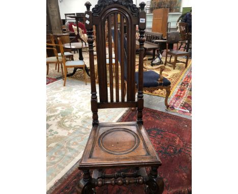 A SET OF TEN WILLIAM AND MARY STYLE ANTIQUE OAK CHAIRS, THE ROUND ARCH TOP RAILS CARVED WITH C-SCROLLS AND SHELL, THE SOLID S